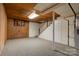 Finished basement with wood-paneled ceiling and a staircase at 608 Hanover Dr, Shelby, NC 28150