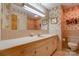 Bathroom with beige tile, vanity with sink, and a toilet at 608 Hanover Dr, Shelby, NC 28150