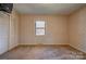 Bright bedroom featuring a window and closet space at 608 Hanover Dr, Shelby, NC 28150