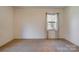 Simple bedroom with beige carpeting and neutral walls at 608 Hanover Dr, Shelby, NC 28150