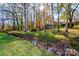 Peaceful creekside setting with a small footbridge at 608 Hanover Dr, Shelby, NC 28150