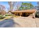 Brick ranch house with carport and landscaping at 608 Hanover Dr, Shelby, NC 28150