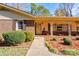 Inviting front porch with brick accents and landscaping at 608 Hanover Dr, Shelby, NC 28150