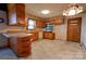 Kitchen boasts wood cabinets, built-in oven, and a breakfast bar at 608 Hanover Dr, Shelby, NC 28150