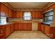Bright kitchen with ample wood cabinetry and a double oven at 608 Hanover Dr, Shelby, NC 28150