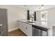 Modern kitchen with island, stainless steel appliances and granite countertops at 710 W Alabama Ave, Bessemer City, NC 28016