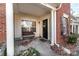 Cozy front porch with a bench, perfect for relaxing at 8424 Summerglen Cir, Charlotte, NC 28227