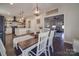 Open concept dining room with kitchen views at 843 Hathcock Glen Dr, Oakboro, NC 28129