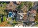Aerial view showcasing home, pool, and surrounding landscape at 18912 Peninsula Point Dr, Cornelius, NC 28031