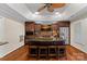 Modern basement kitchen featuring an island and stainless steel appliances at 18912 Peninsula Point Dr, Cornelius, NC 28031