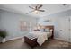 Comfortable bedroom with a queen bed and neutral color palette at 18912 Peninsula Point Dr, Cornelius, NC 28031