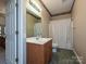 Clean bathroom with shower/tub combo, vanity, and updated fixtures at 25040 Timberlake Dr, Tega Cay, SC 29708