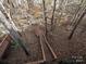 Wooden stairs leading down to the backyard at 25040 Timberlake Dr, Tega Cay, SC 29708