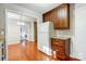 Kitchen with dark wood cabinets, granite countertops, and stainless steel appliances at 2507 Lawton Bluff Rd, Charlotte, NC 28226