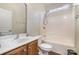 Clean bathroom with tub, shower, and updated vanity at 3116 Village Glen Ln, Charlotte, NC 28269