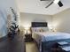 Main bedroom with a queen bed, nightstands, and ceiling fan at 3215 24Th Ne St, Hickory, NC 28601