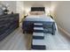 Main bedroom with a queen bed, dresser, and ceiling fan at 3215 24Th Ne St, Hickory, NC 28601