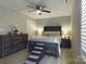 Main bedroom with a queen bed, dresser, and ceiling fan at 3215 24Th Ne St, Hickory, NC 28601