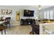 Spacious living room with large TV, comfortable seating, and wood-look flooring at 3215 24Th Ne St, Hickory, NC 28601