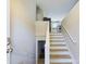 Modern staircase with light wood treads and white risers, leading to the upper level at 3215 24Th Ne St, Hickory, NC 28601