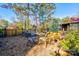 Relaxing backyard patio with seating area and garden at 600 W Warren St, Shelby, NC 28150