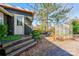 Private backyard with patio, garden, and seating area at 600 W Warren St, Shelby, NC 28150