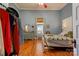 Cozy bedroom with hardwood floors, ample closet space, and a ceiling fan at 600 W Warren St, Shelby, NC 28150