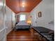 Cozy bedroom with wood floors, white walls, and a double bed at 600 W Warren St, Shelby, NC 28150