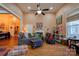 Spacious living room with hardwood floors, fireplace and large windows at 600 W Warren St, Shelby, NC 28150