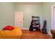 Home office featuring hardwood floors and ample storage shelving at 600 W Warren St, Shelby, NC 28150