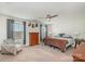 Spacious bedroom with large bed, dresser, and window with curtains at 6721 Lennox St, Indian Land, SC 29707