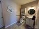 Main bathroom with walk-in shower and updated vanity at 7855 Nc Highway 90 E None, Stony Point, NC 28678