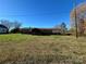 Ranch house exterior view, showcasing the backyard at 7855 Nc Highway 90 E None, Stony Point, NC 28678