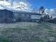 Brick ranch house with screened porch and yard at 7855 Nc Highway 90 E None, Stony Point, NC 28678