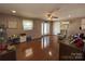 Bright living room with hardwood floors and access to other rooms at 7855 Nc Highway 90 E None, Stony Point, NC 28678