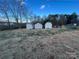 Three storage sheds in a large backyard at 7855 Nc Highway 90 E None, Stony Point, NC 28678