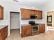 Kitchen features stainless steel appliances and ample cabinet space at 827 Hathcock Glen Dr, Oakboro, NC 28129