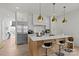 Modern kitchen with stainless steel appliances and an island at 9025 Tynecastle Commons Ct # 2, Charlotte, NC 28226