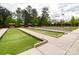 Well-maintained bocce ball courts with benches and shade at 1042 Gregory Jon Ct, Fort Mill, SC 29707