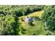 House with a large backyard surrounded by trees, seen from an aerial perspective at 1727 Will Schronce Rd, Lincolnton, NC 28092