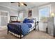 Bedroom with metal bed frame, dresser, and gray walls at 1727 Will Schronce Rd, Lincolnton, NC 28092