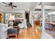 Bright entryway showcasing hardwood floors, a grand staircase, and views into the living room and kitchen at 1727 Will Schronce Rd, Lincolnton, NC 28092