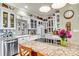 Modern kitchen with white cabinets, granite countertops, and stainless steel appliances at 1727 Will Schronce Rd, Lincolnton, NC 28092