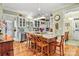 Charming kitchen with white cabinets, granite countertops, and an island at 1727 Will Schronce Rd, Lincolnton, NC 28092