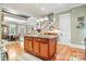 Kitchen island with granite countertop and wooden cabinetry at 1727 Will Schronce Rd, Lincolnton, NC 28092