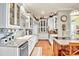 Bright kitchen boasting white cabinets, granite countertops, and stainless steel appliances at 1727 Will Schronce Rd, Lincolnton, NC 28092