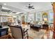 Spacious living room featuring hardwood floors, a fireplace, and ample natural light at 1727 Will Schronce Rd, Lincolnton, NC 28092