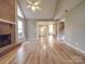 Spacious Gathering room with hardwood floors and brick fireplace at 2000 Shadwell Ct, Gastonia, NC 28056