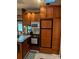Modern kitchen with wood cabinets and appliances at 204 Lake Tillery Trl, Mount Gilead, NC 27306