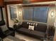 Relaxing living room with sleeper sofa and window at 204 Lake Tillery Trl, Mount Gilead, NC 27306